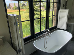 Using louvered shutters and doors in a bathroom